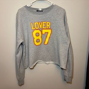 Gray Cropped Sweatshirt with Yellow and Red Print